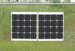 solar panel hanging on fence